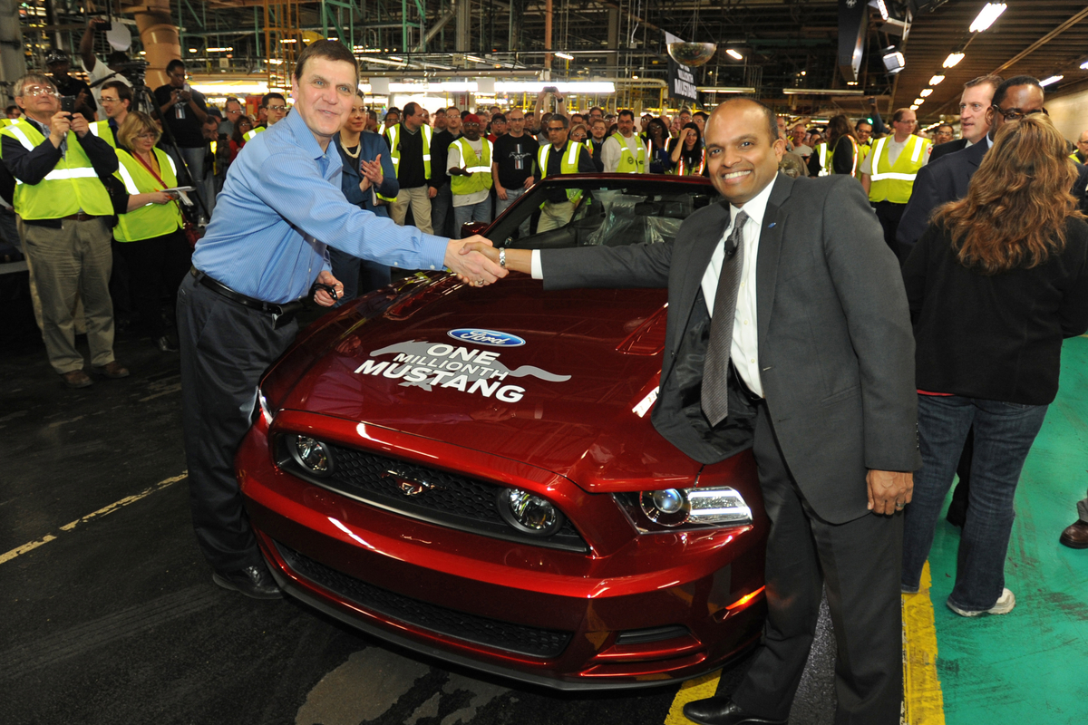 Flat Rock, Mi. Flat Rock Assembly Plant's most senior Ford employee, Ed Salina, drives the 1 millionth Mustang off the line with Raj Nair, group vice president for product development at the Flat Rock Assembly Plant. (04/17/2013)