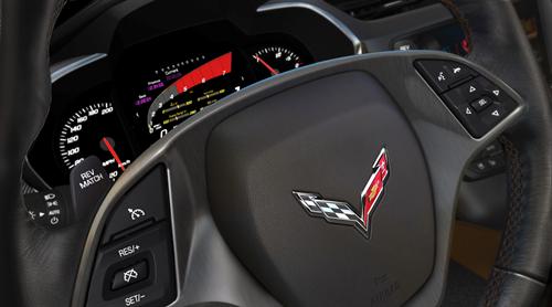 The 2014 Chevrolet Corvette Stingray features an advanced cluster display that prioritizes information around three specific driving scenarios: touring, sport, and track.