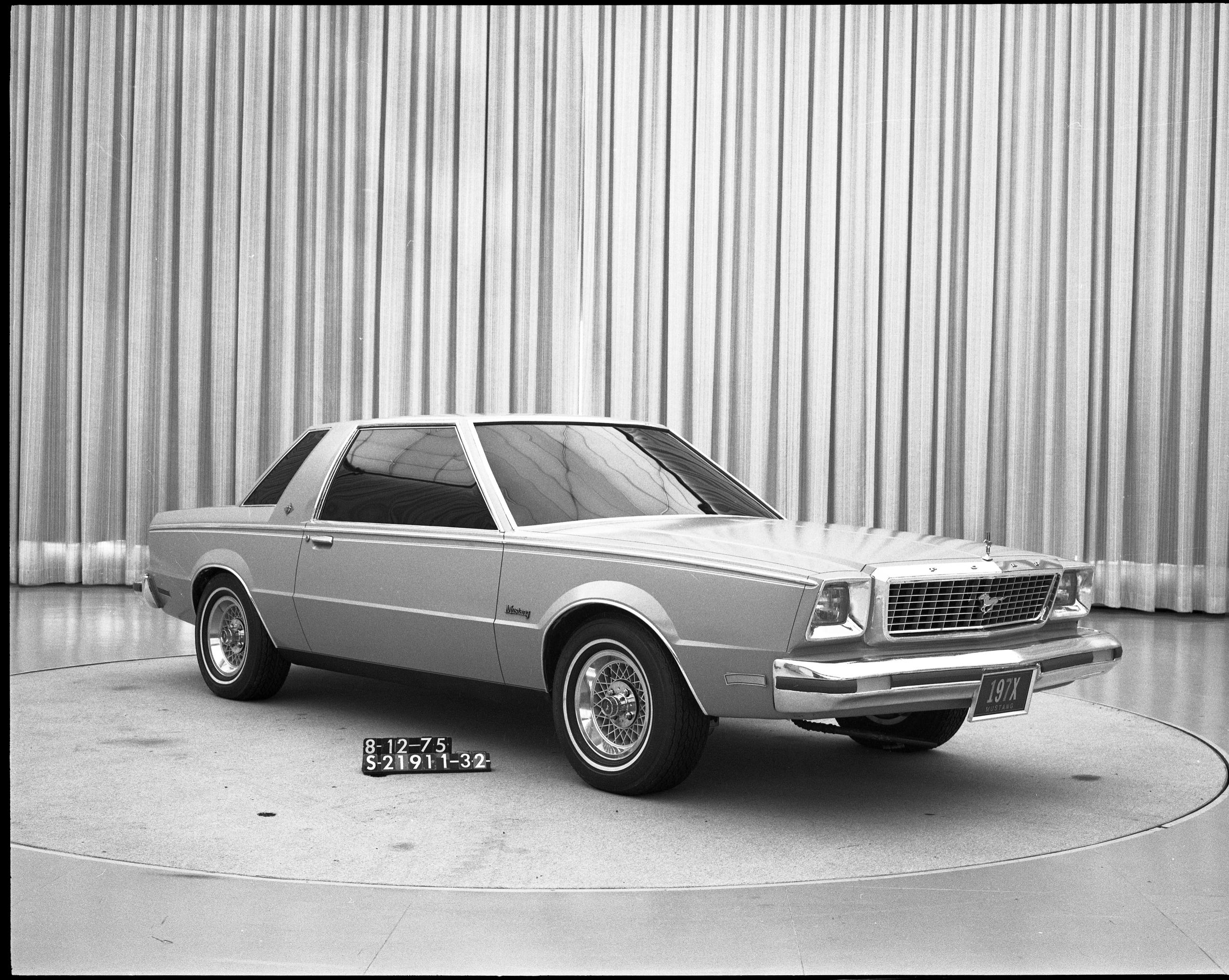 A full-scale mockup that carries over some Mustang II front end styling elements in a squared-off, more formal treatment