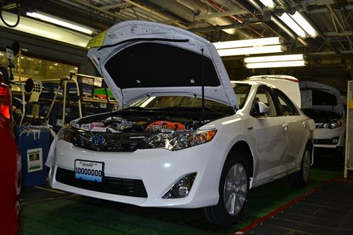 The 10 millionth vehicle assembled at Toyota Motor Manufacturing, Kentucky, Inc. (TMMK), a Camry Hybrid, rolls down the line in May 2014.