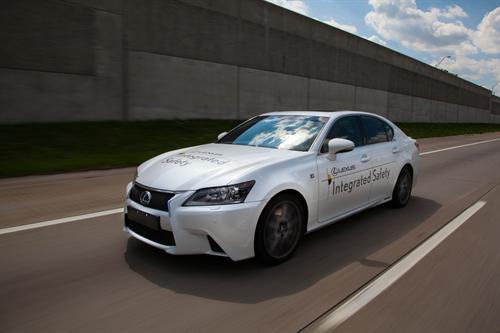 Toyota demonstrates its Automated Highway Driving Assist system on public roads in Detroit during its fourth annual Toyota Advanced Safety Seminar on Sept. 4, 2014.