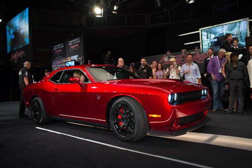 This one-of-a-kind 2015 Dodge Challenger SRT Hellcat VIN0001, hand painted Stryker Red, sold for $825,000 at the Barrett-Jackson Auction in Las Vegas this weekend, with all proceeds going to benefit not-for-profit charity, Opportunity Village.The Las Vegas-based Engelstad Family Foundation matched the auction price, bringing the total raised from the Dodge Challenger SRT Hellcat auction to $1.65 million.