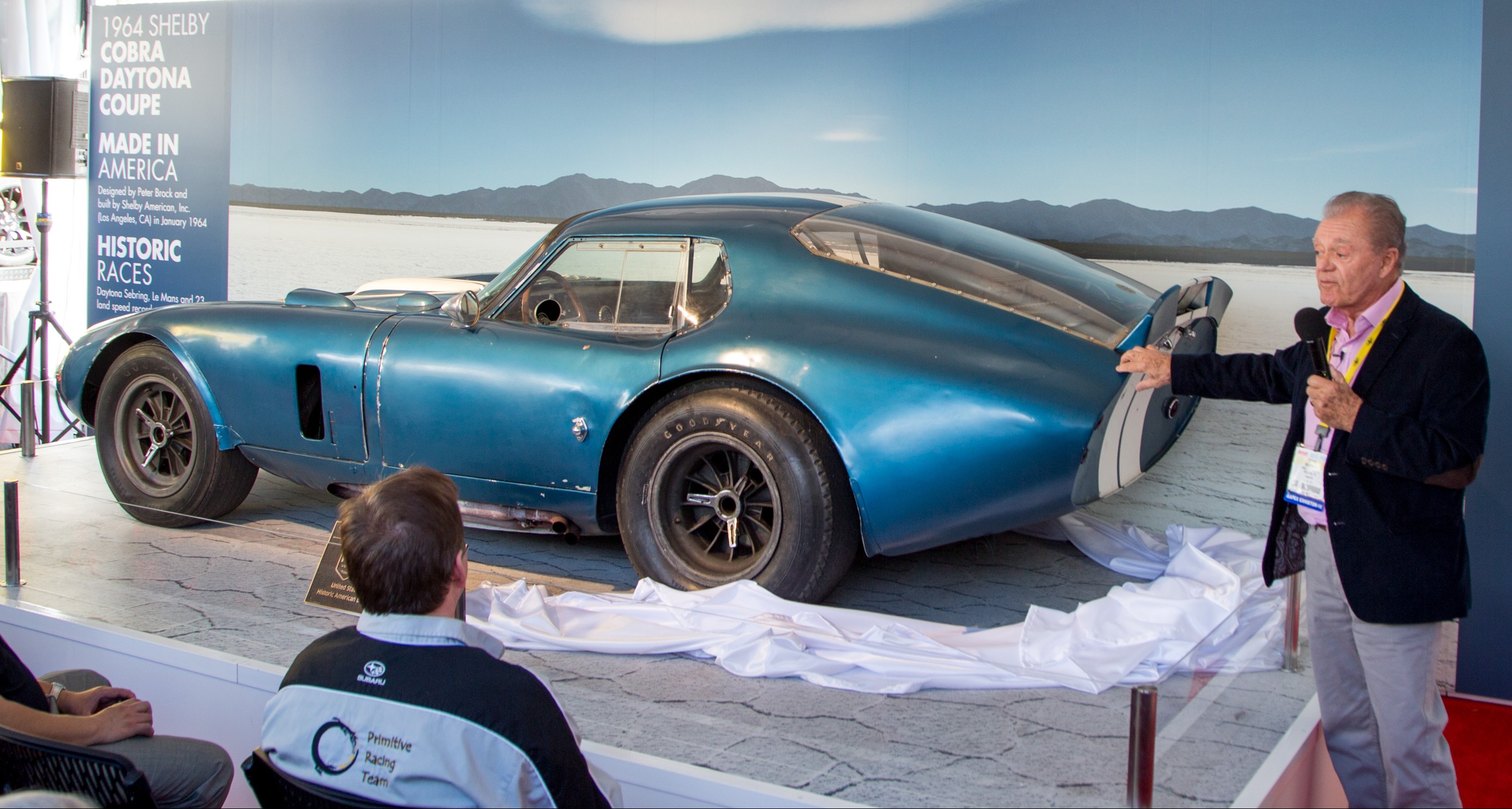 Driver Craig Breedlove unveils the 1964 Shelby Cobra Daytona Coupe at the Shell Pioneering Performance Experience during the 2015 SEMA Show.