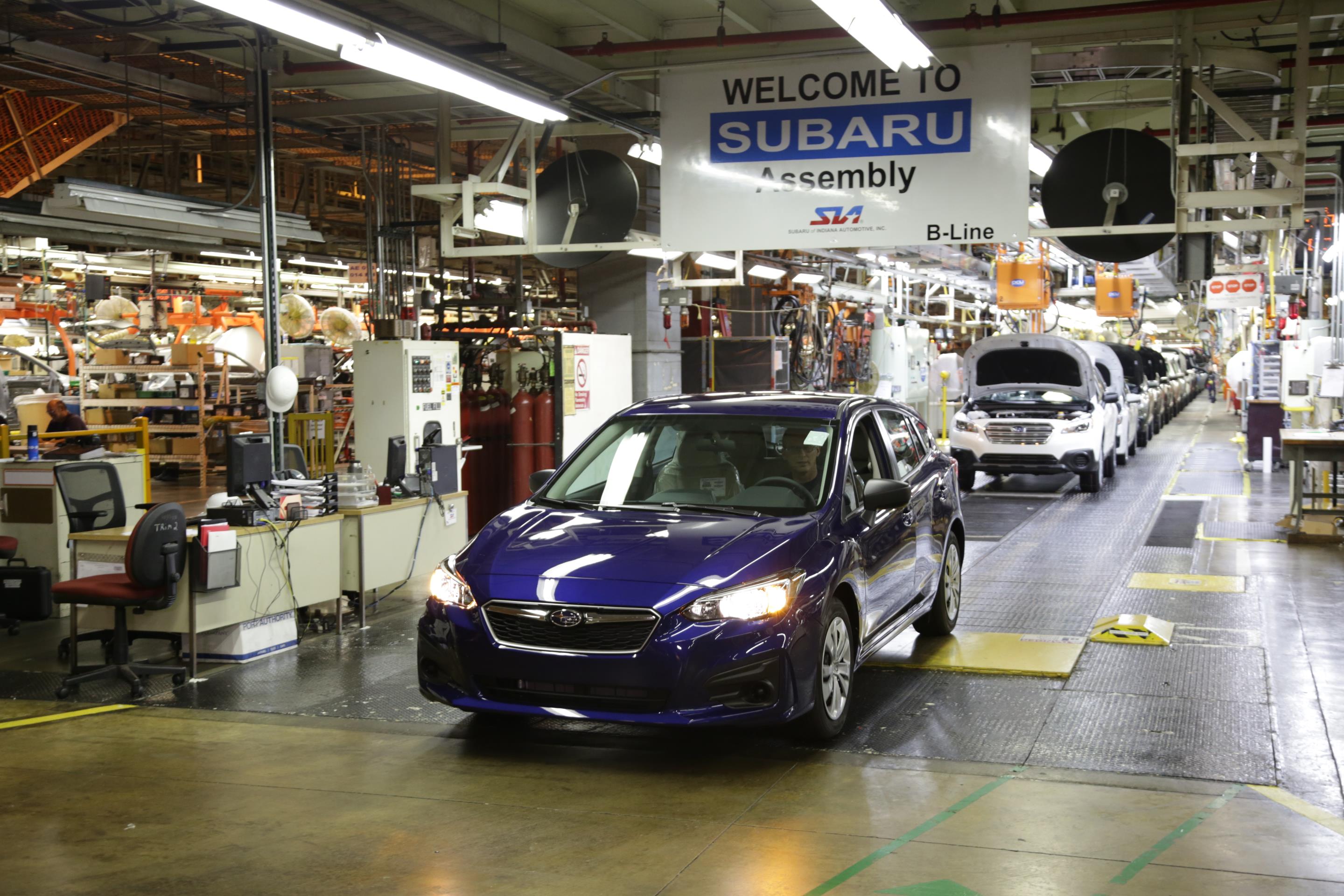 The first American-made 2017 Subaru Impreza rolls off the assembly line at Subaru of Indiana Automotive (SIA) plant in celebration event.