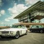 A Jensen Interceptor and FF on top of the famous old Fiat factory at Lingotto in Turin